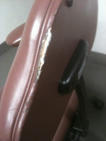 Damaged leather desk chair